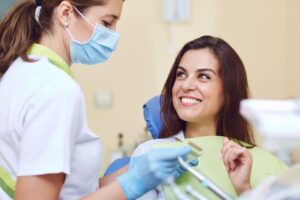 Comparison of dental implants and bridges at Hadley Green Dental for tooth replacement options