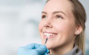 Different types of dental veneers at Hadley Green Dental, including porcelain and composite veneers for various smile needs