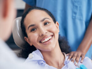Smiling patient after treatment with a dentist in a London clinic